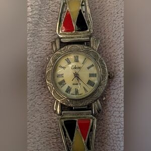 Working Womens Calezio Silver Tone Roman Numeral Watch with Red & Black Inlay